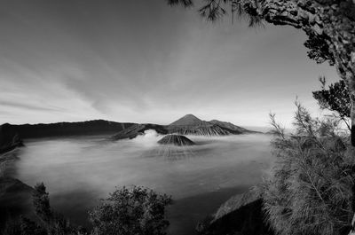 View of volcanic landscape against sky