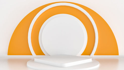 Close-up of white umbrella on table