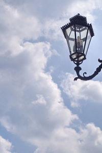 Low angle view of street light against sky