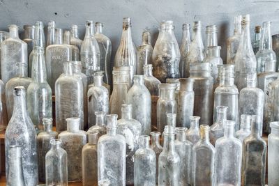 Close-up of old bottles