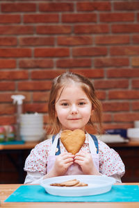 Portrait of a girl eating food