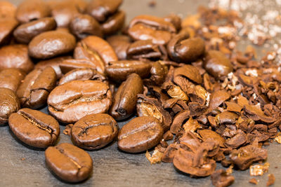 Close-up of coffee beans on table