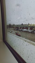 Close-up of wet window in rainy season