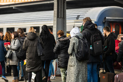 Rear view of people in train