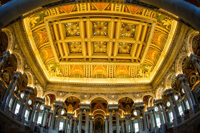 Low angle view of illuminated ceiling of building