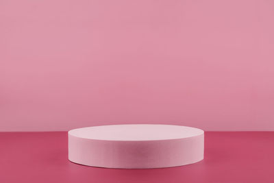 Close-up of pills against pink background