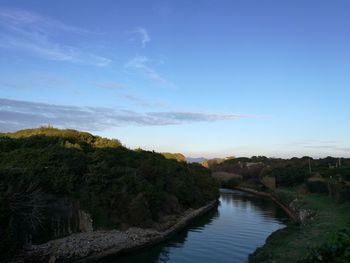 Scenic view of river against sky