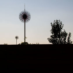 Low angle view of street light against sky