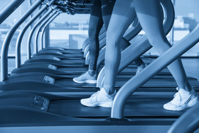 Low section of woman exercising in gym