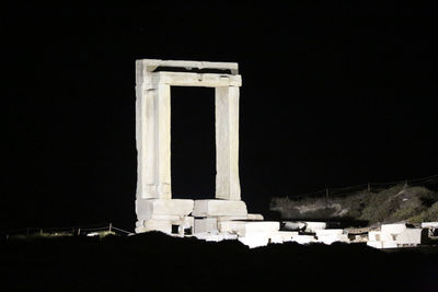 Built structure against sky at night