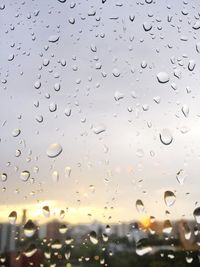 Full frame shot of wet glass window