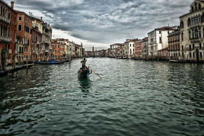 View of canal next to buildings