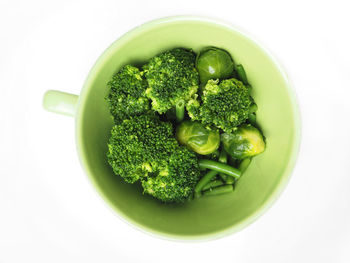 Directly above shot of vegetables on white background