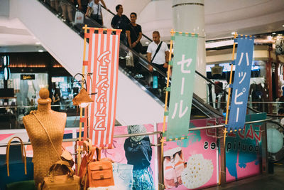 High angle view of text on railing at store