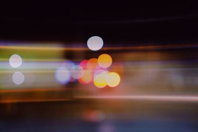 Defocused image of illuminated lights at night