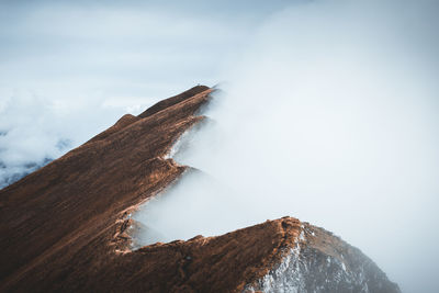 Rock formations on mountain against sky