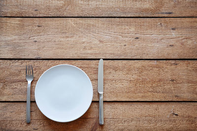 High angle view of bread on wooden table