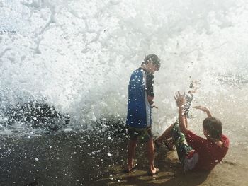 Woman playing in water