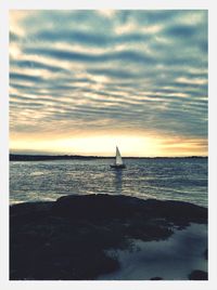 Scenic view of sea at sunset