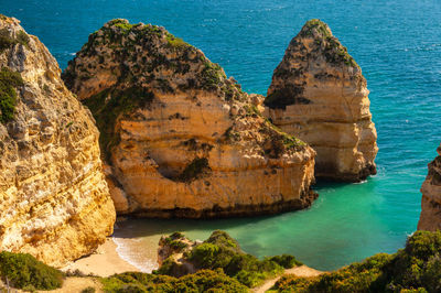 Scenic view of rock formation in sea