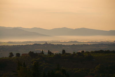 Scenic view of mountains against sky during sunset