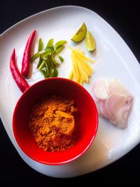 High angle view of ingredients in plate on table