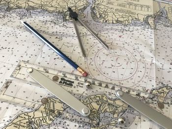 High angle view of arrow symbol on table