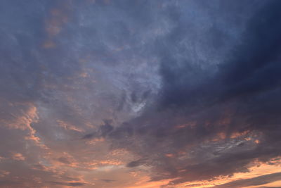 Low angle view of dramatic sky during sunset