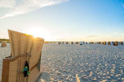 Scenic view of beach against sky during sunset