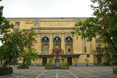 Group of people in front of building