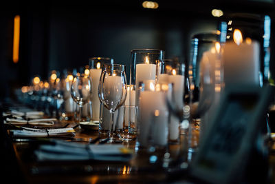 Luxury table settings for fine dining with and glassware, pouring wine to glass.