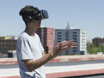 Virtual reality experience young man having a funny moment