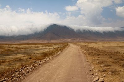 Dirt road passing through a desert