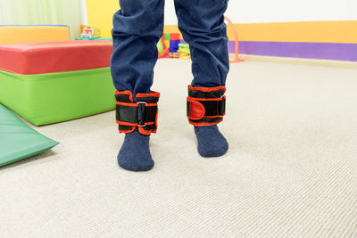 Sensory activities, ankle weights on children's feet.
sensory integration