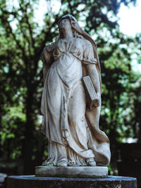 Statue of angel in cemetery