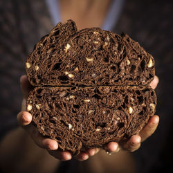 Close-up of hand holding bread