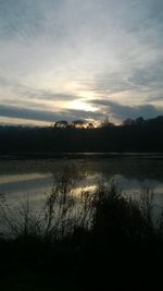 Scenic view of lake during sunset