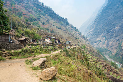 Scenic view of landscape and mountains against sky