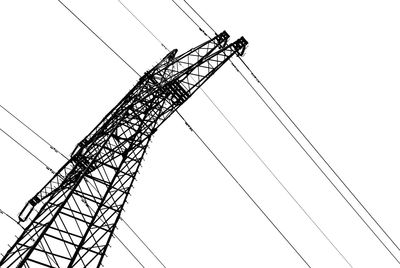 Low angle view of crane against clear sky