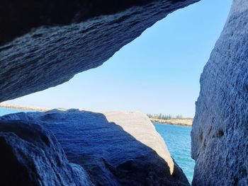 Scenic view of sea against clear blue sky