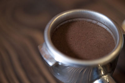 Close-up of coffee cup on table