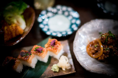 Close-up of sushi served on table