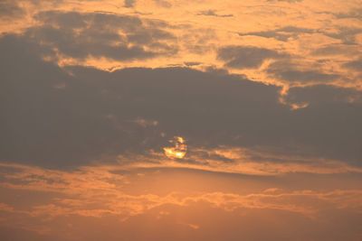 Low angle view of dramatic sky during sunset