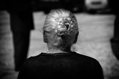 Rear view of a old woman