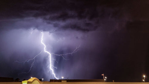 High angle view of lightning over blurred background