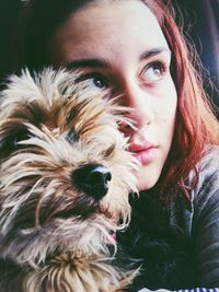 Close-up of woman with dog