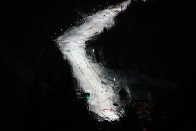 High angle view of illuminated road at night