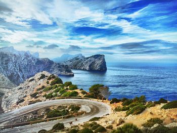 Scenic view of sea against cloudy sky