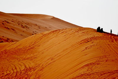 Scenic view of desert against clear sky