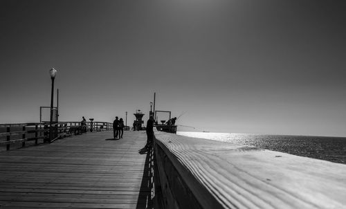 Pier on sea against sky